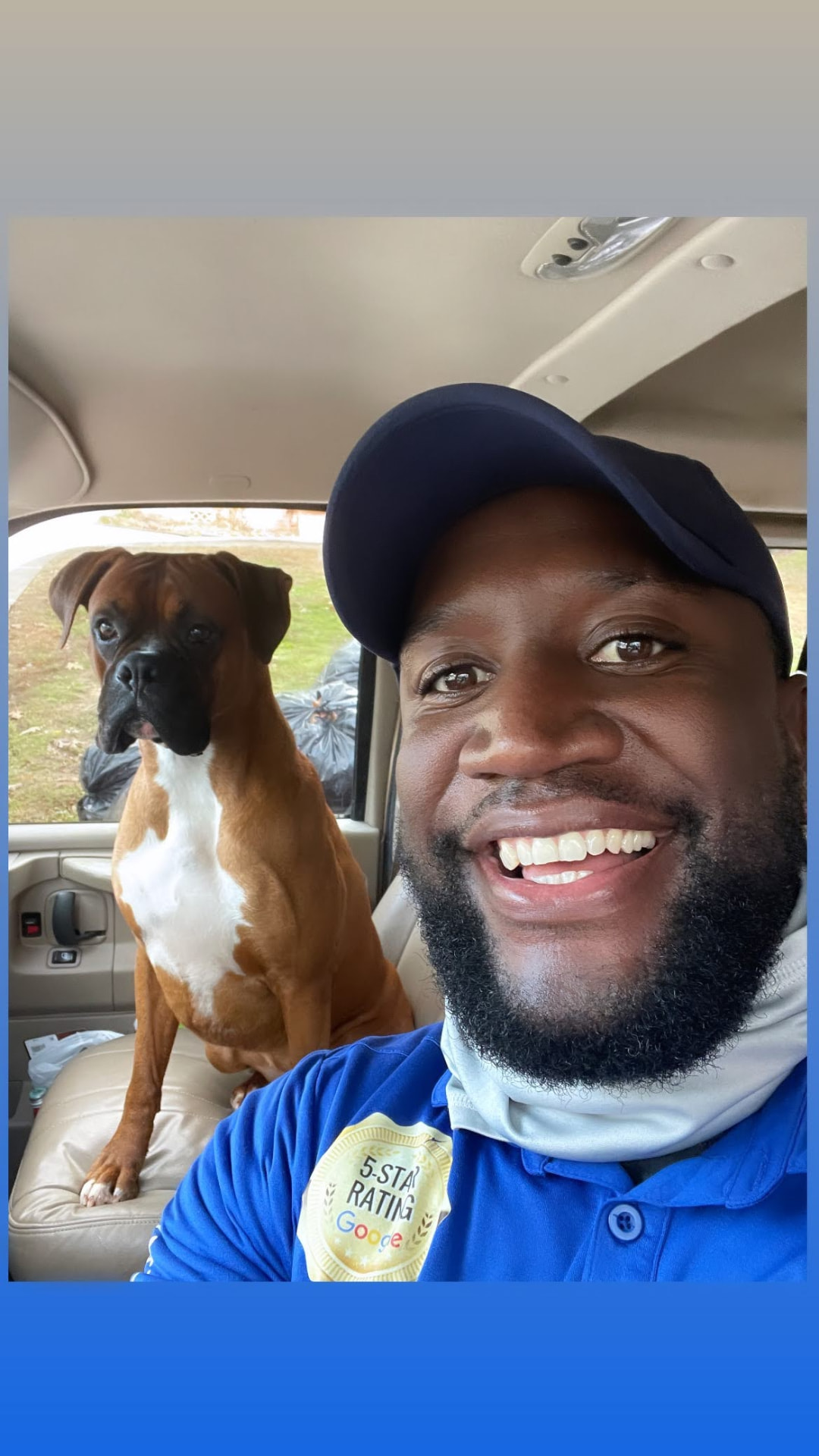 Smiling Samsonite Painting & More owner with shop dog